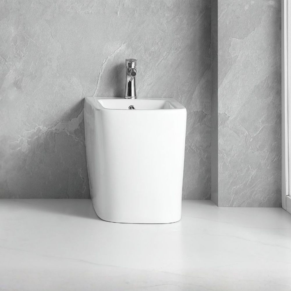 Bidet a pavimento filo muro FB54D in ceramica 54x36x42H cm bianco Bidet a pavimento filo muro FB54D in ceramica 54x36x42H cm bianco