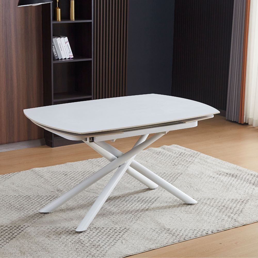 Tavolo girevole automatico allungabile Astrid con piano in ceramica bianco opaco con gambe colore bianco Tavolo girevole automatico allungabile Astrid con piano in ceramica bianco opaco con gambe colore bianco