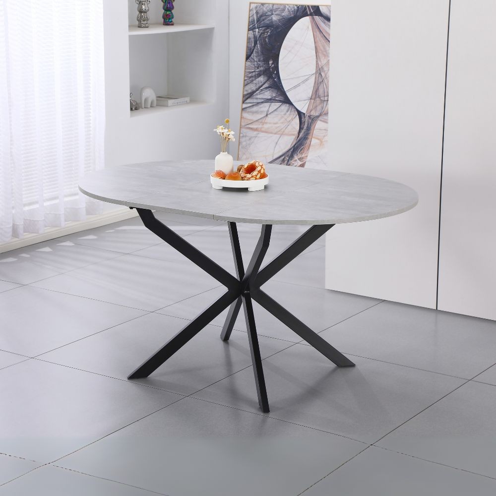 Tavolo rotondo allungabile Rut con piano colore cemento e gambe in metallo nero Tavolo rotondo allungabile Rut con piano colore cemento e gambe in metallo nero